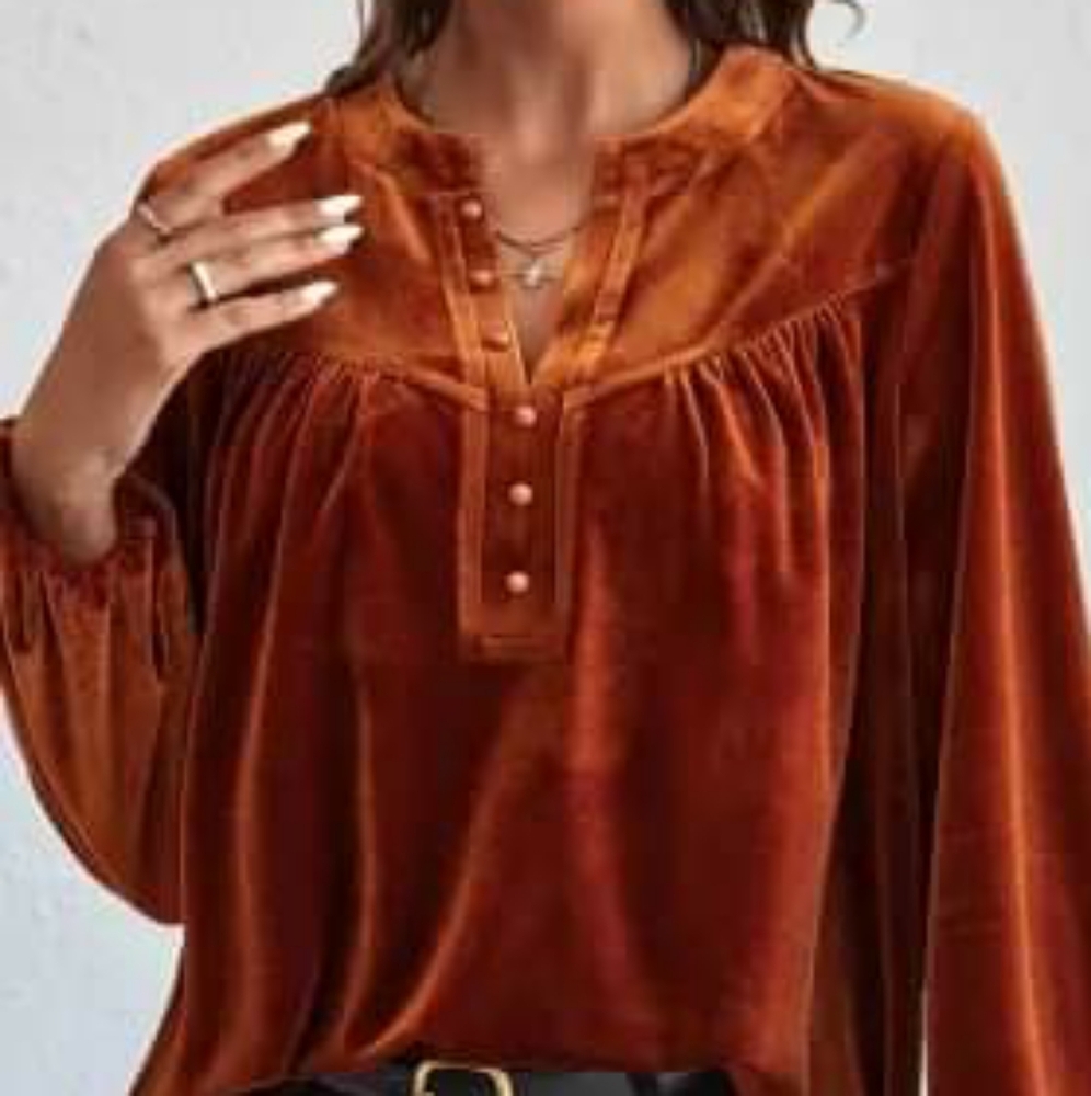 Long sleeve rust shirt. Or buy a box full of sm to large for $100.